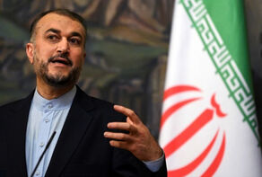 Iran's FM: Talks for lifting the imposed sanctions are in progress