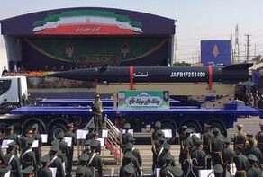 Iran parades hypersonic, cruise missiles as Raisi lauds defense achievement