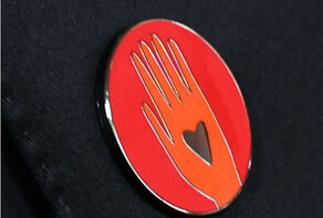 Celebrities at Oscars wear red pins to support Gaza ceasefire calls