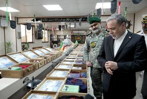 Iran’s FM visits memorial exhibition of Dena destroyer martyrs